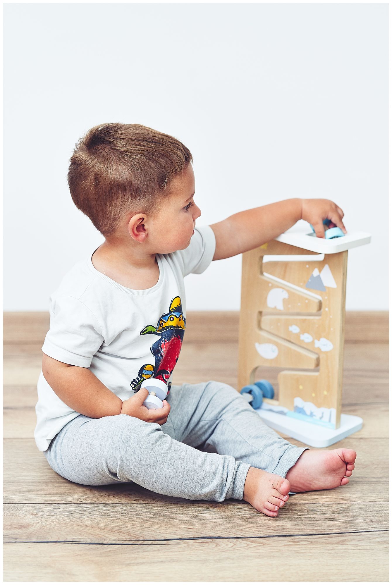 Medinė dvipusė sensorinė manipuliavimo lenta